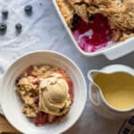 apple crumble served with custard and ice cream