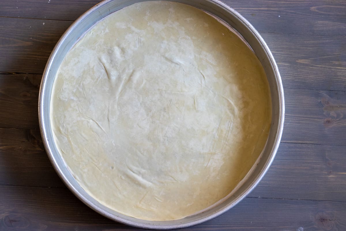 a piece of filo dough is placed on a tray
