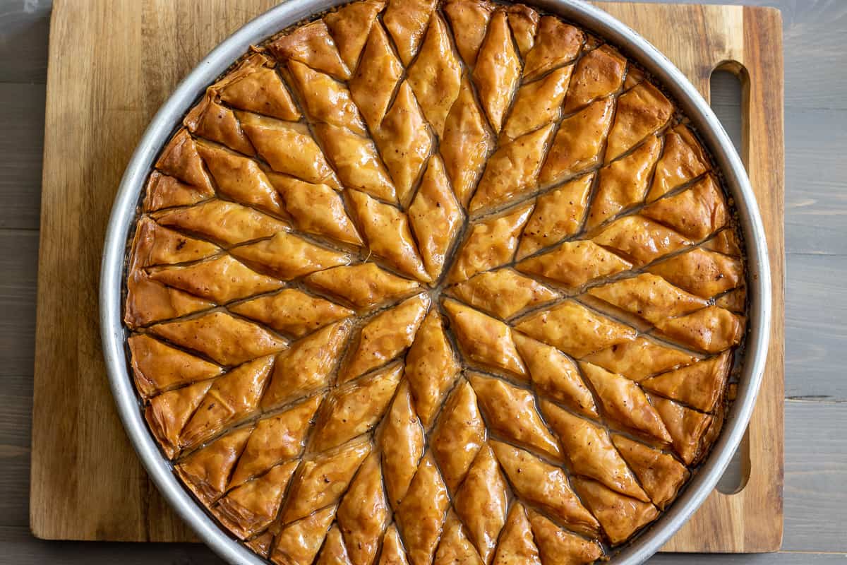 Authentic middle eastern walnut baklawa is soaked in syrup