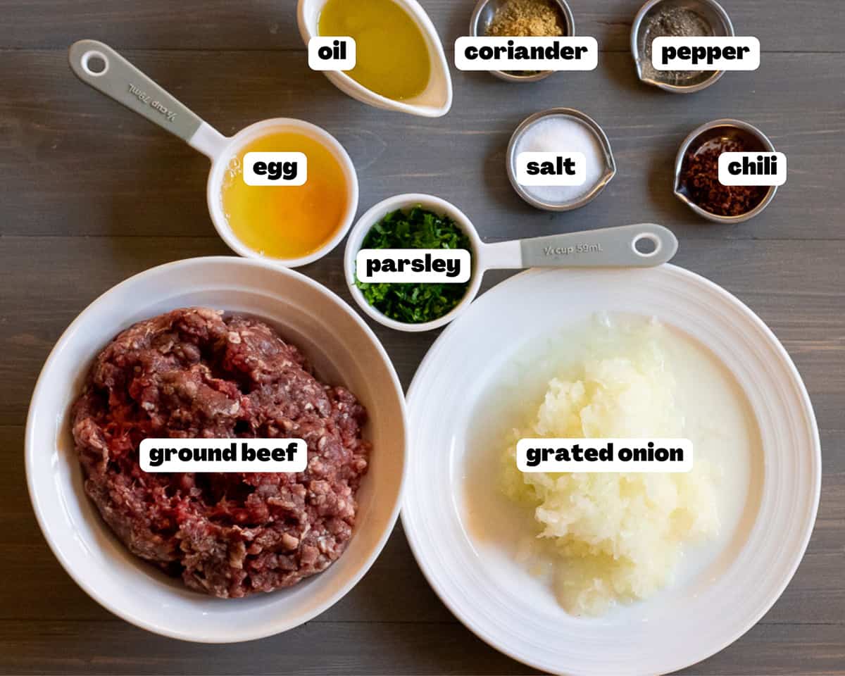 Labelled picture of ingredients for creamy and spicy meatball pasta dish