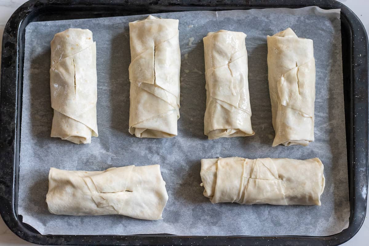6 pieces of borek on baking sheet