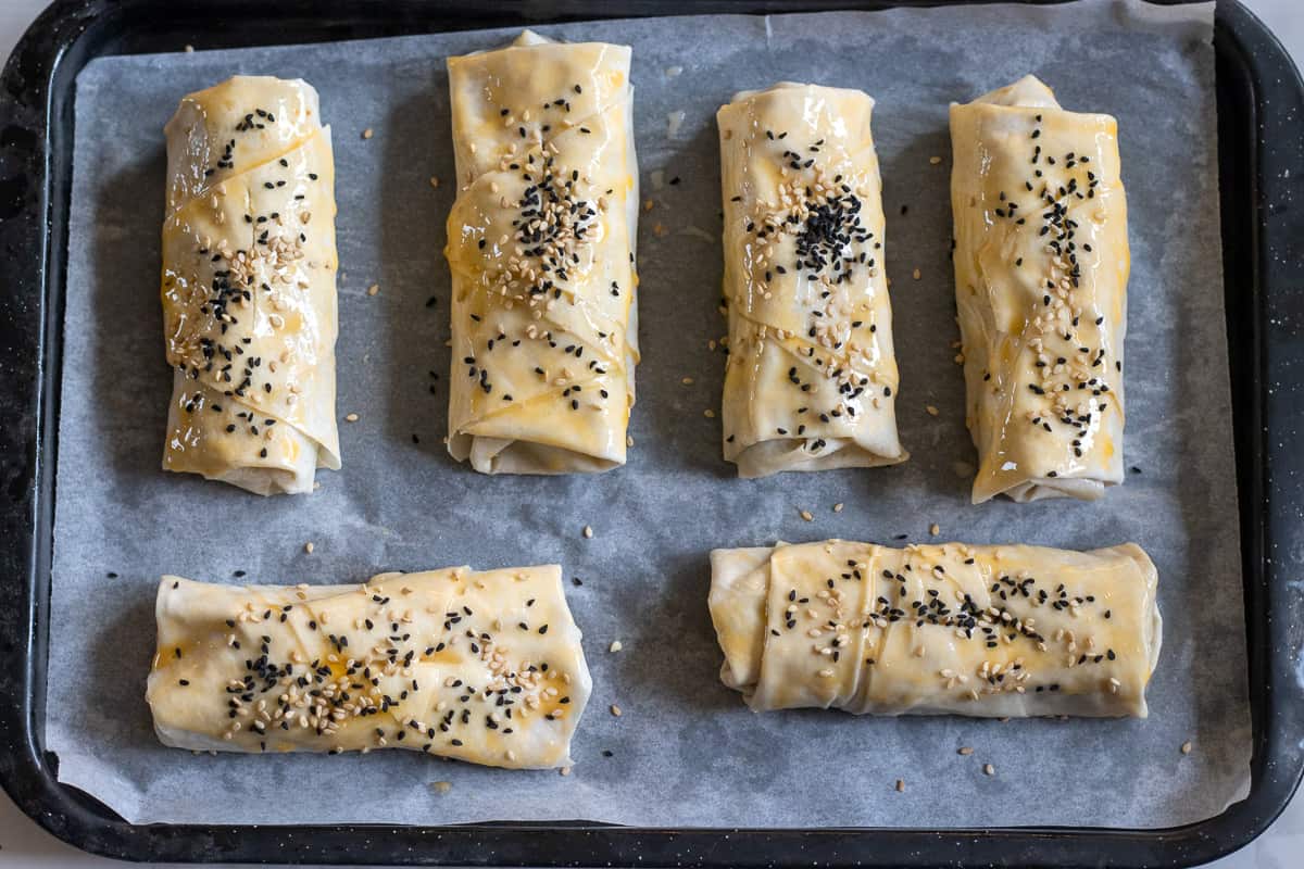 boreks are brushed with egg yolk