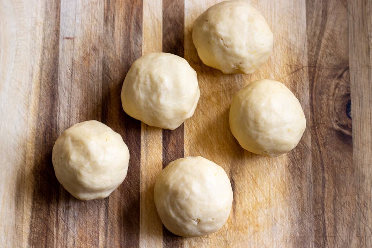the cookie dough is divided into 5 equal sized balls