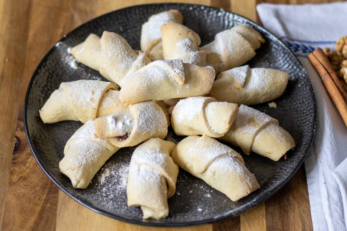 turkish apple cookies are dusted with icing sugar