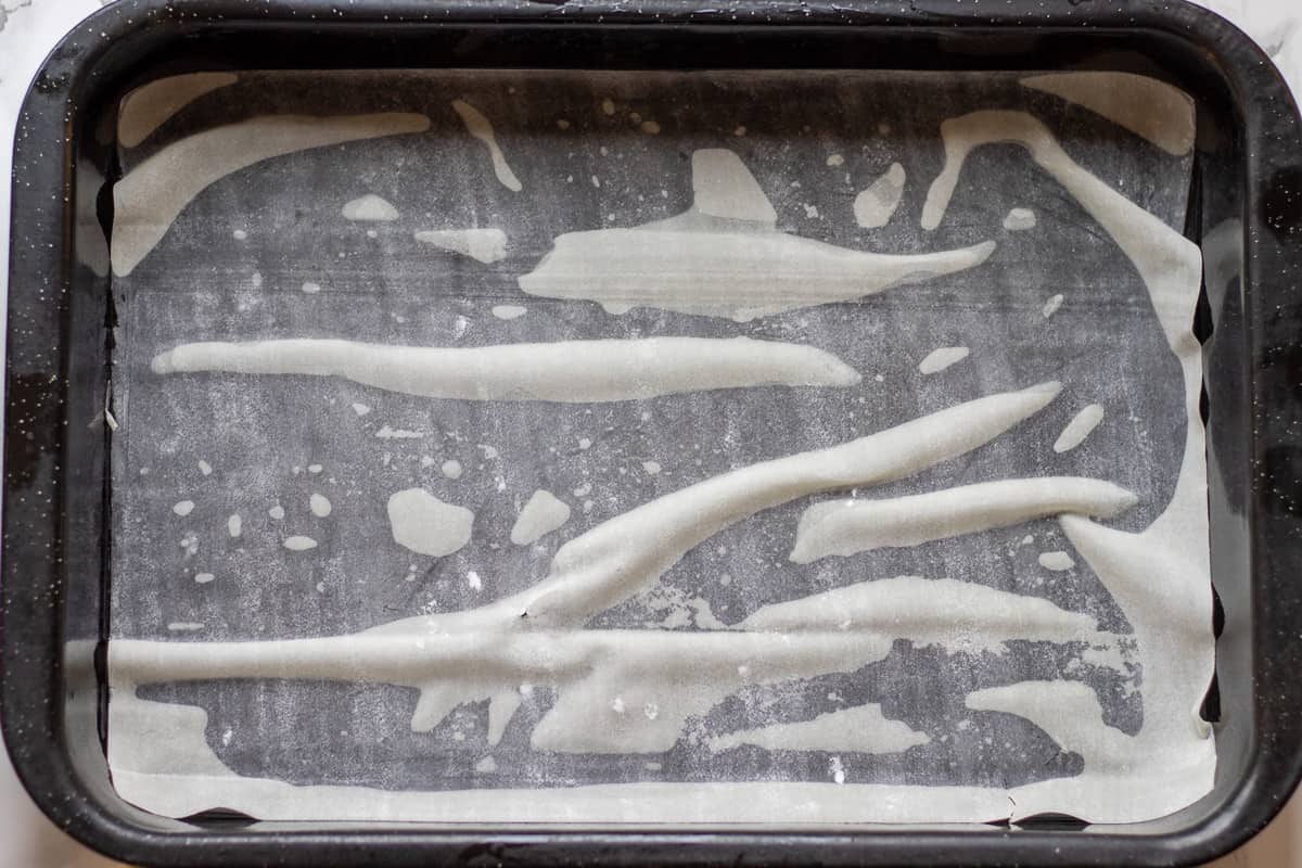1 piece of filo pastry is layered on a bottom of a baking dish