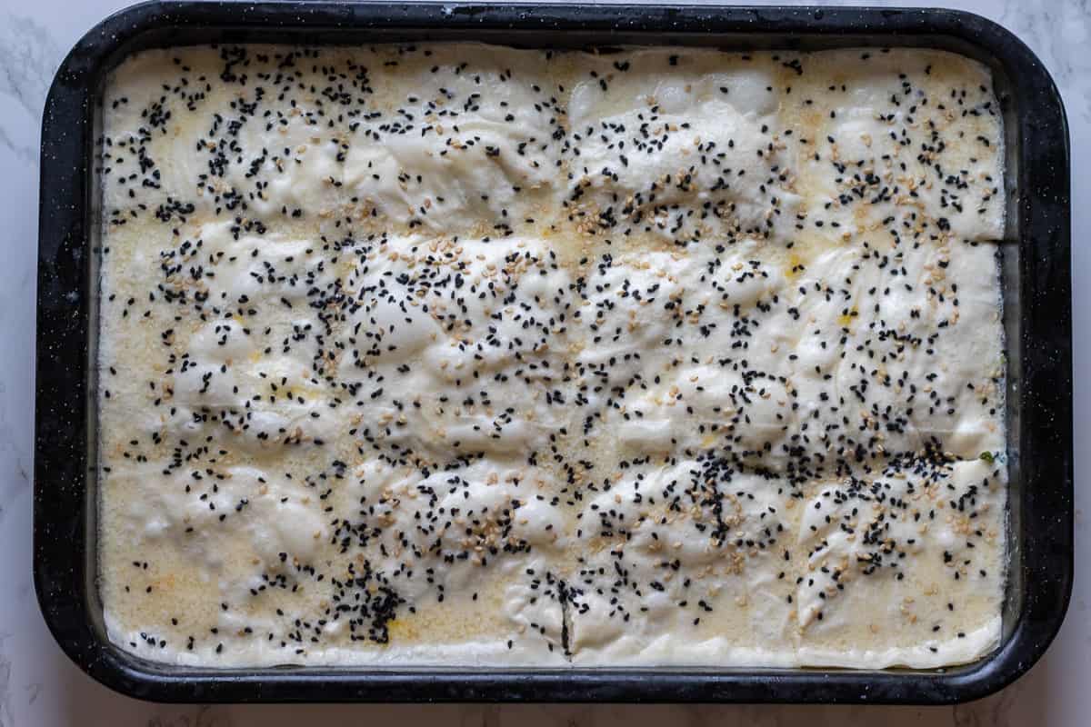 meat and spinach pie is ready to bake