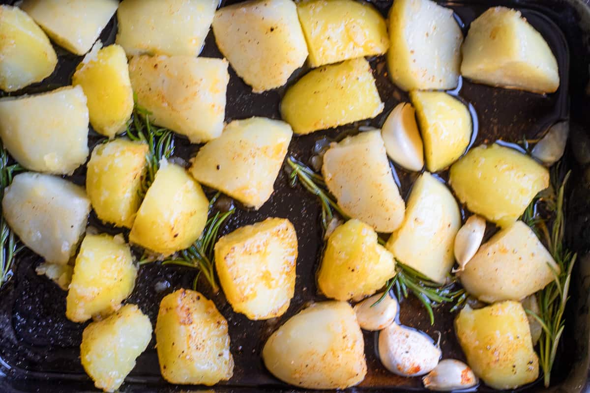 Potatoes are placed on the baking sheet