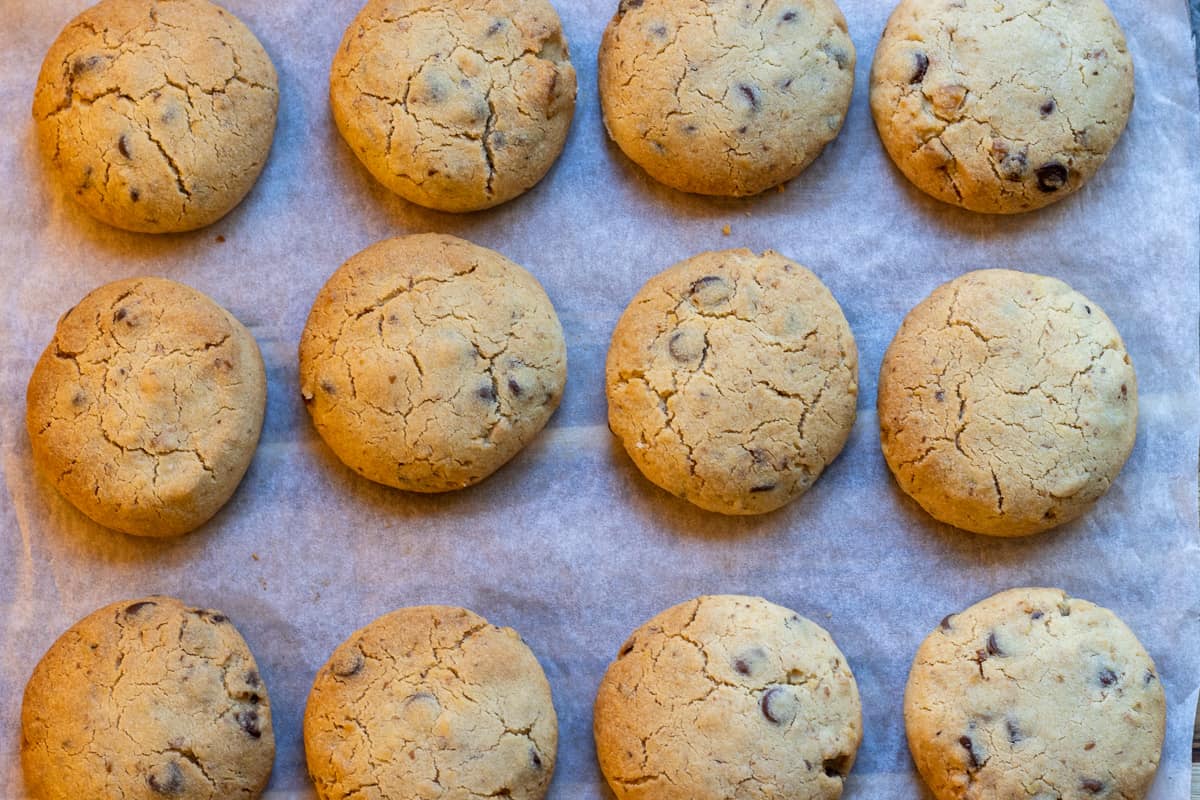 Chocolate chip cookies are baked until slightly brown