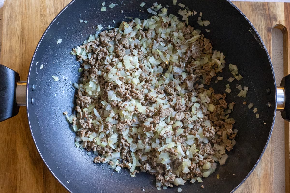 Sautéing the onions with mince
