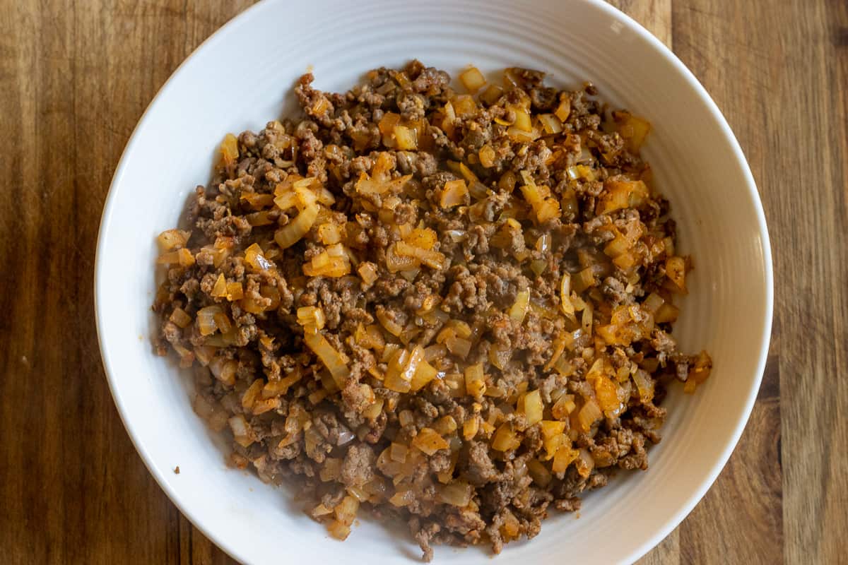 Kiymali Borek filling is let to cool down in a bowl