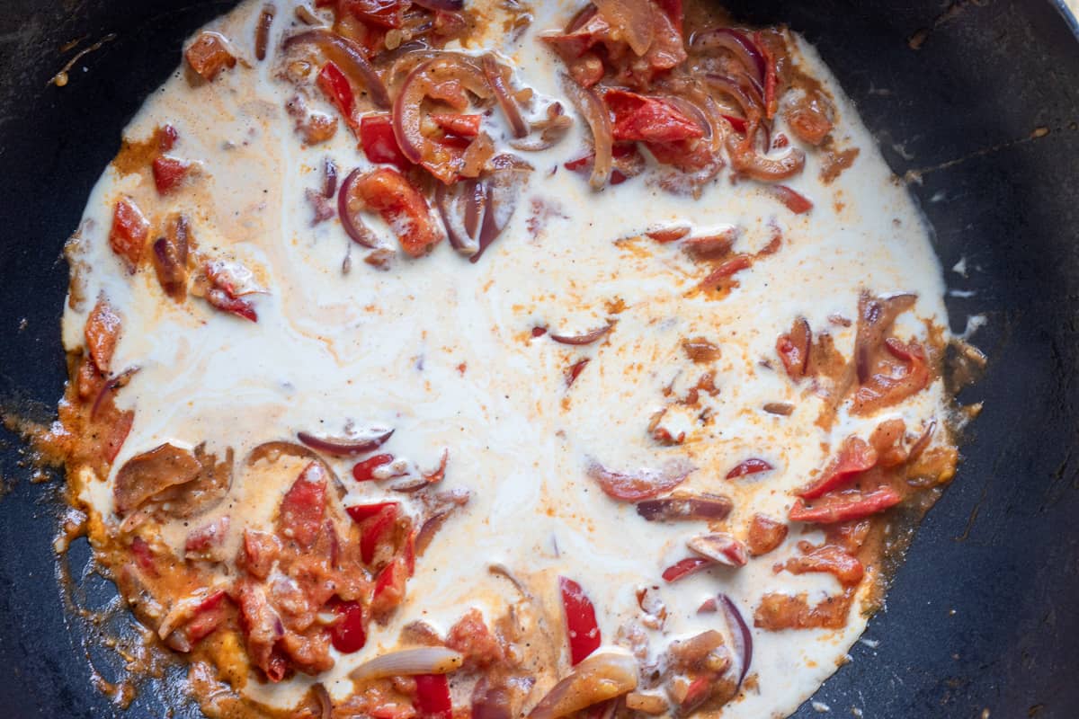 the double cream is added to the pan