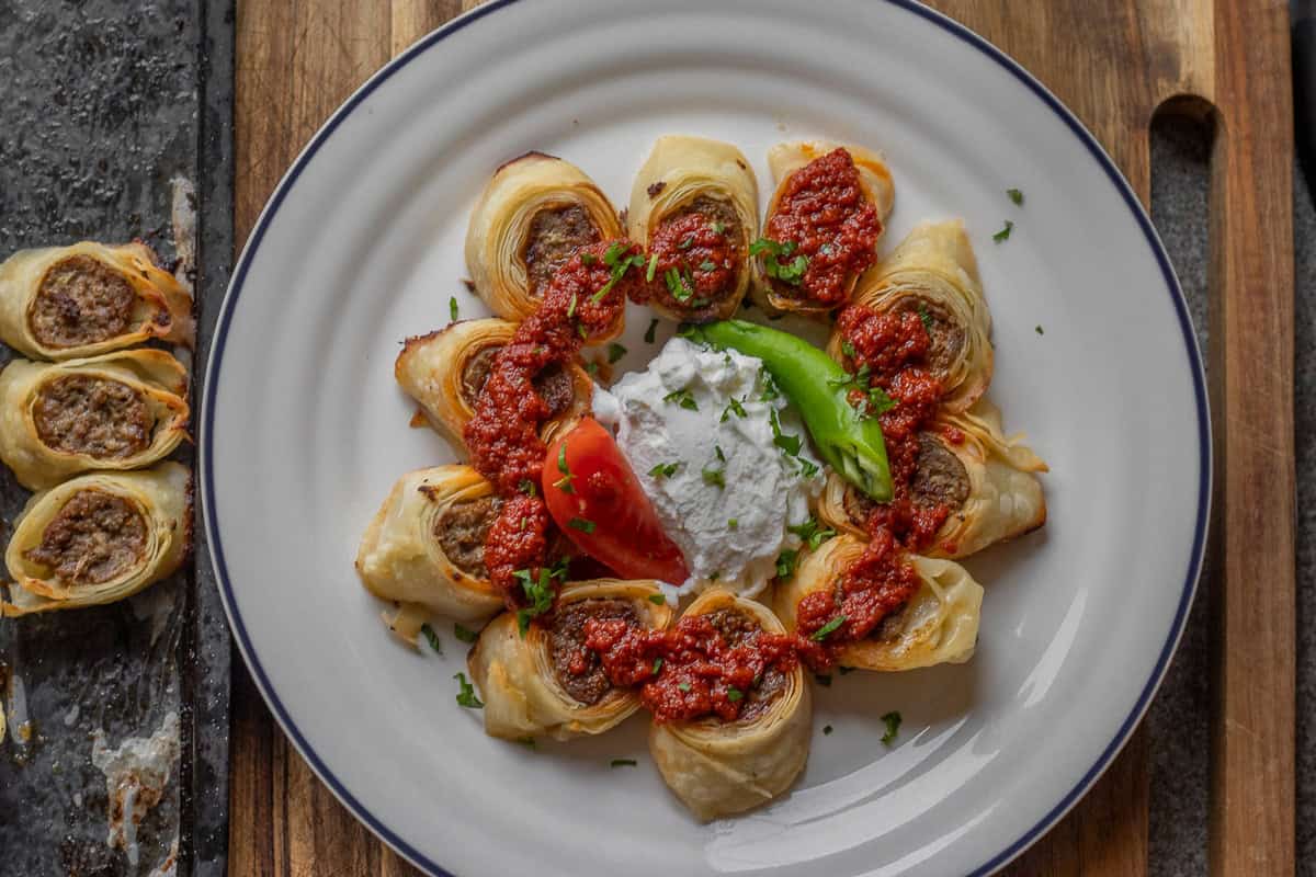 beyti kebab served with yogurt