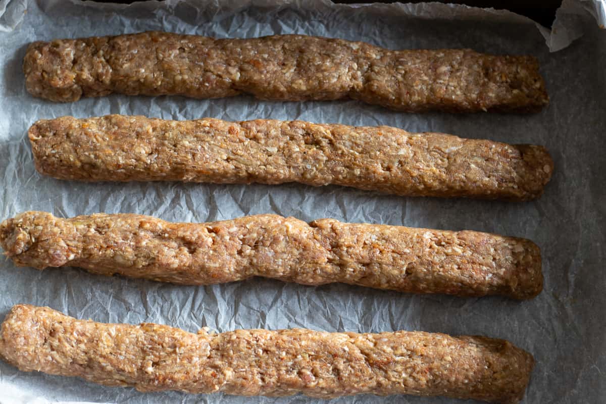 kofte mixture is shaped into long sausages