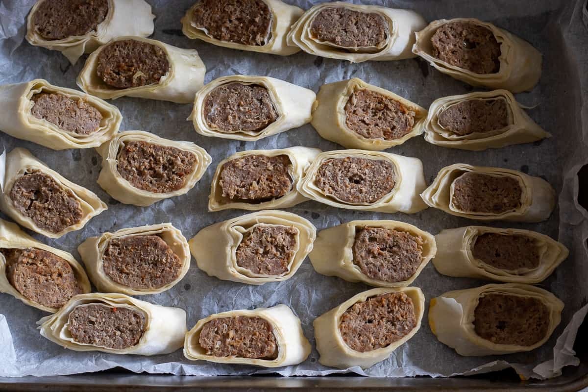 the kofte pieces are placed on a tray