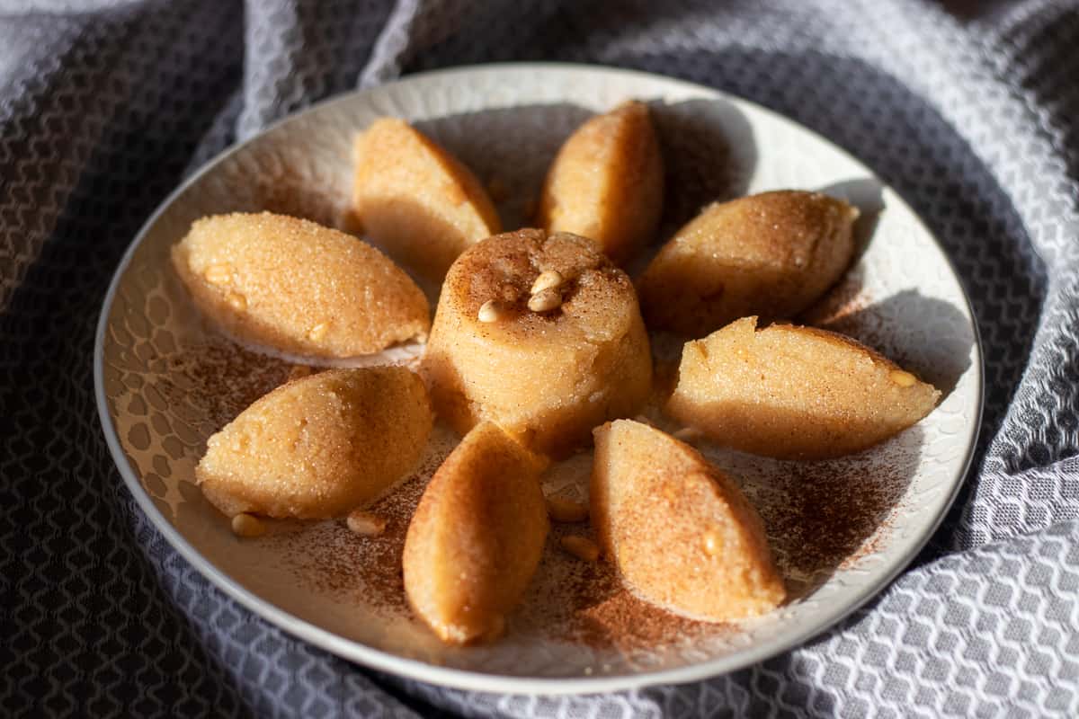 9 pieces of Irmik Helvasi (Turkish Semolina halva)on a plate