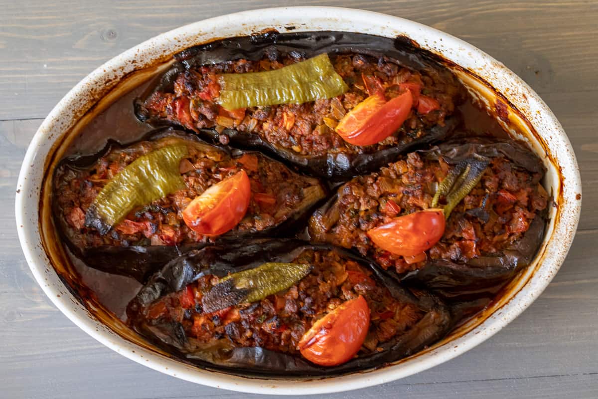 freshly baked 4 pieces Karniyarik in a baking dish