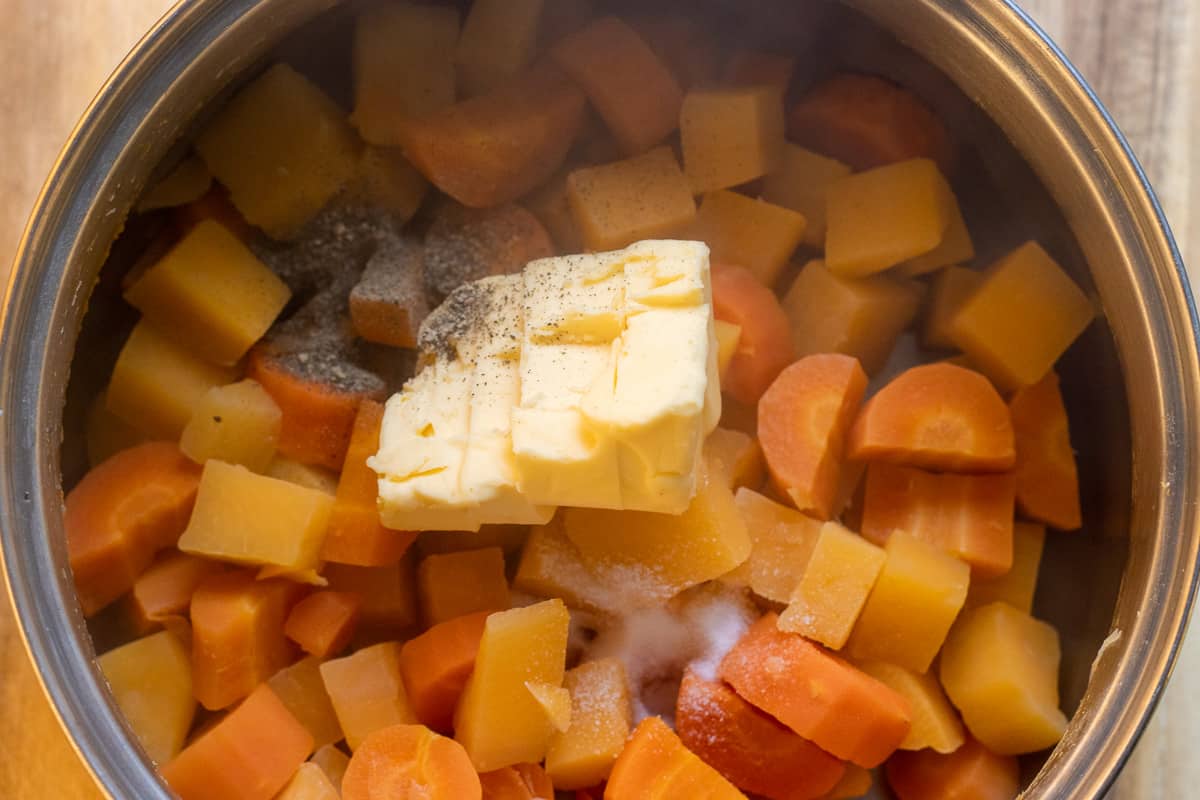 butter, salt and pepper are added to the cooked vegetables