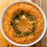 swede and carrot mash garnished with chives