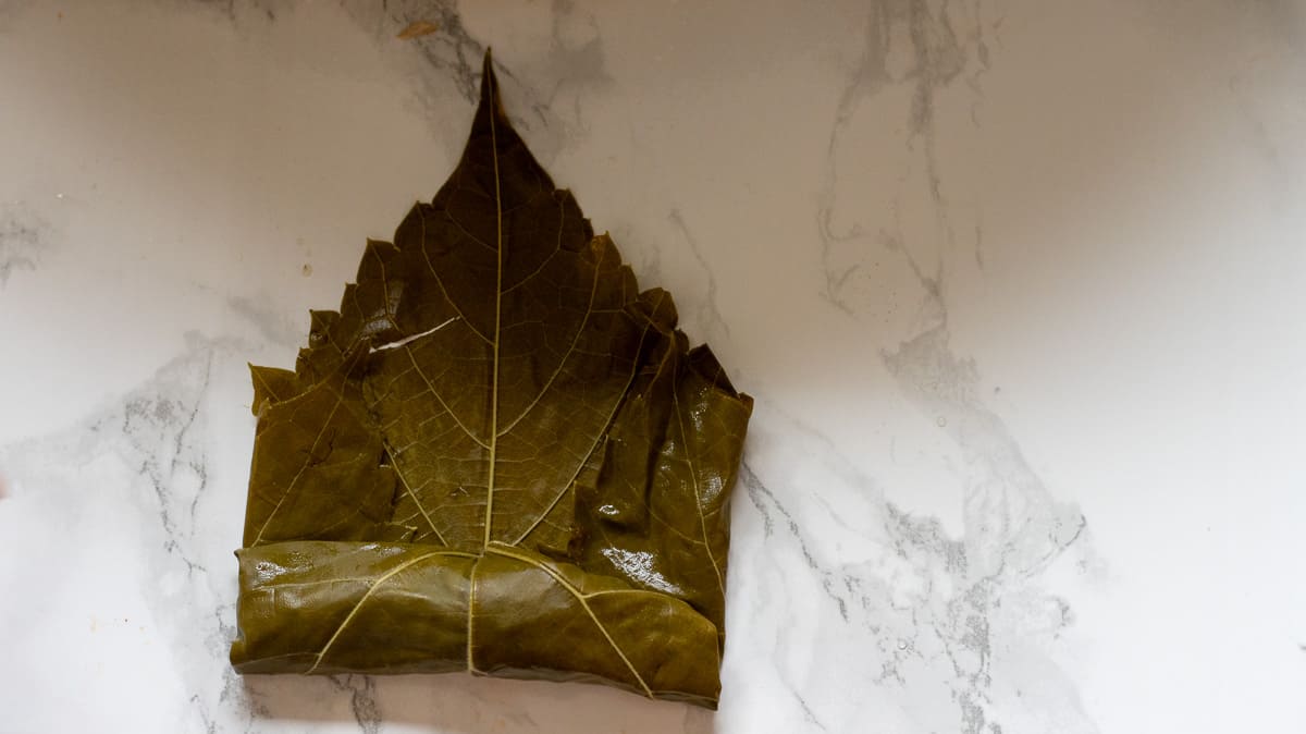 roll the grape leaf tightly