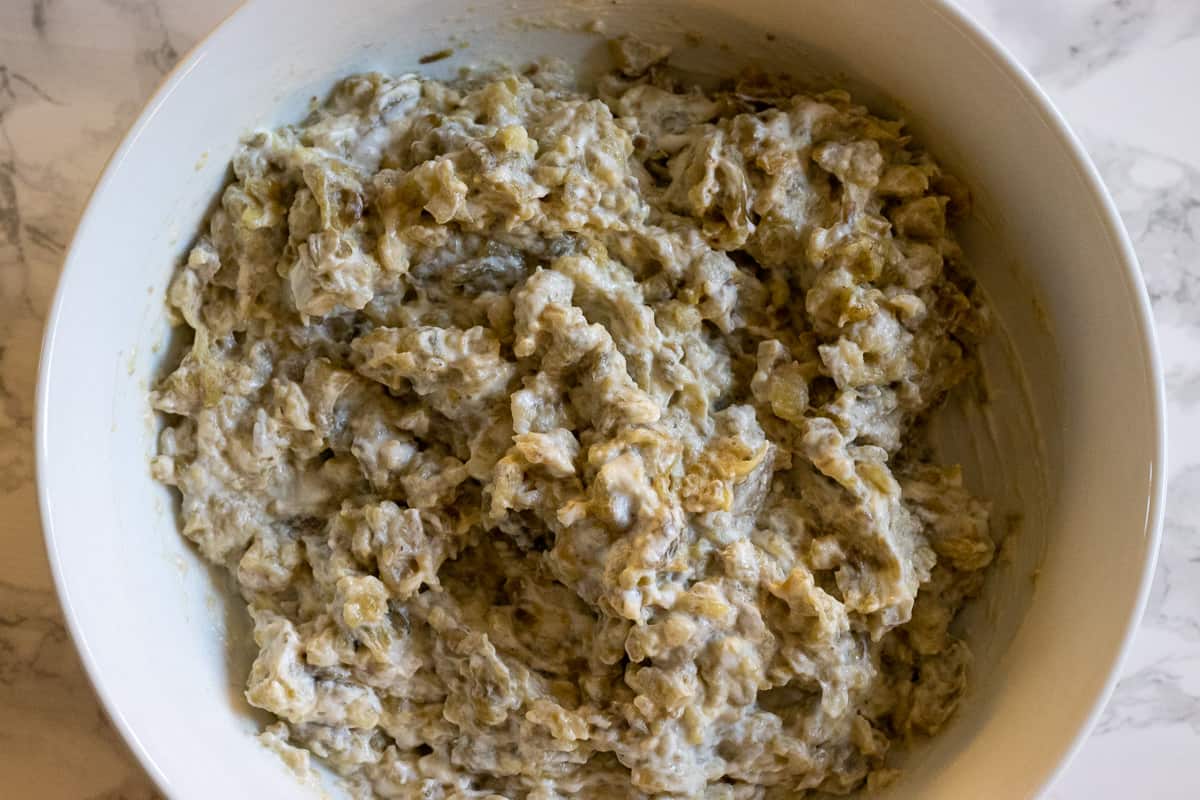 yoghurt is mixed with chopped aubergines