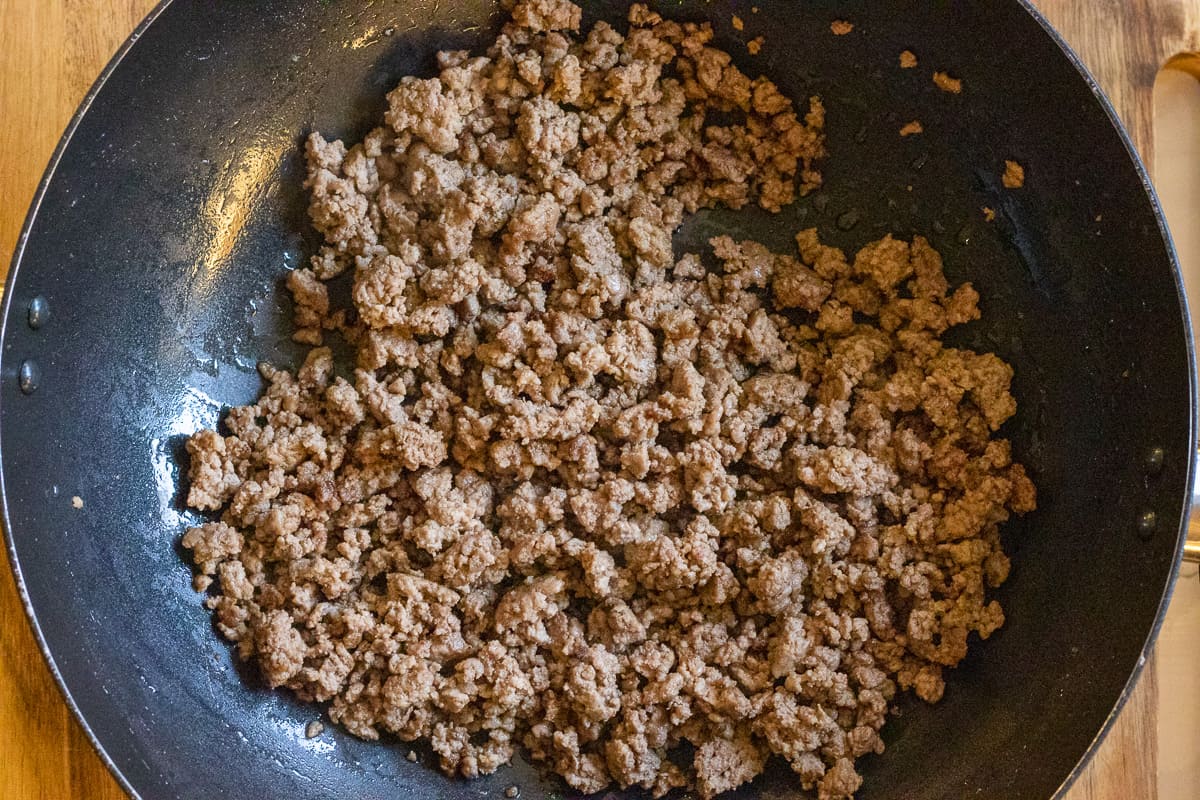 Browning the mince in a wok