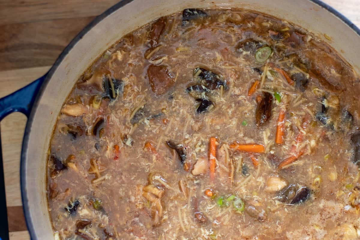 the slurry and eggs are added to the soup for thickening it