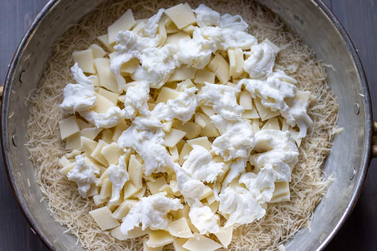 the cheese cut in cubes and scattered on kadaif