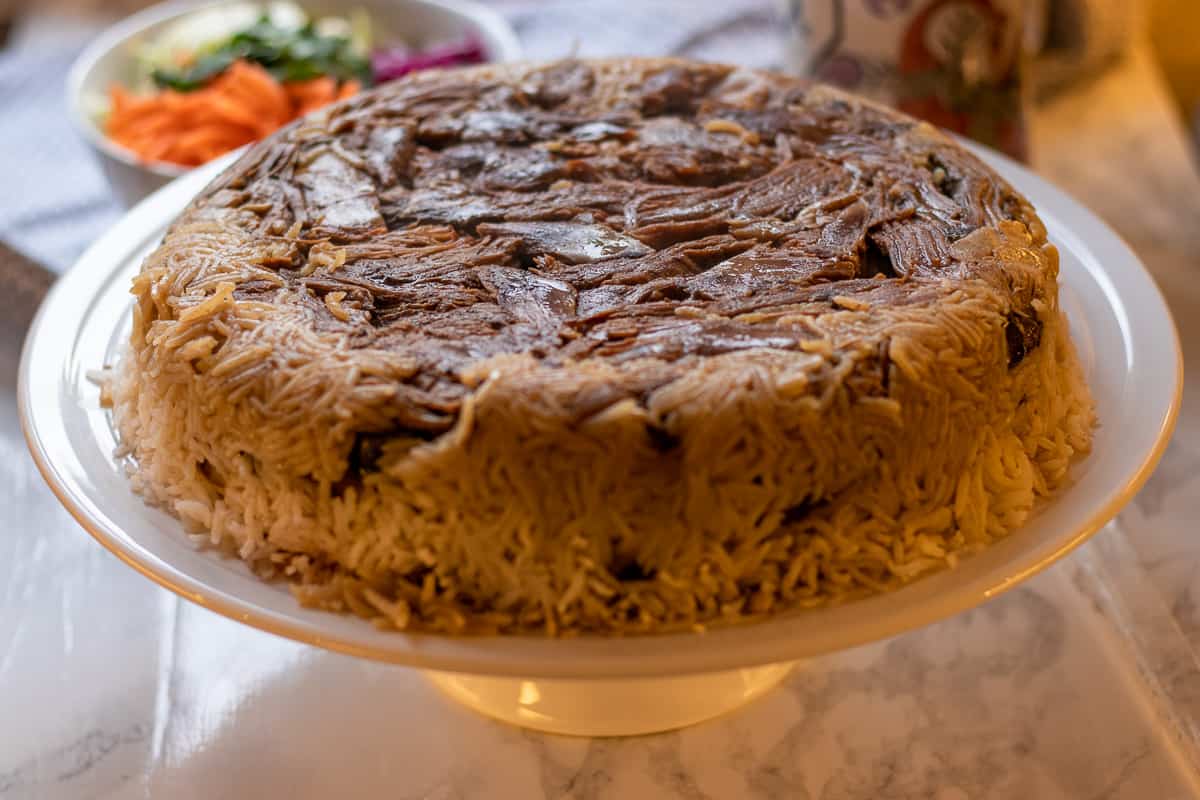 Maqluba is presented on a serving plate