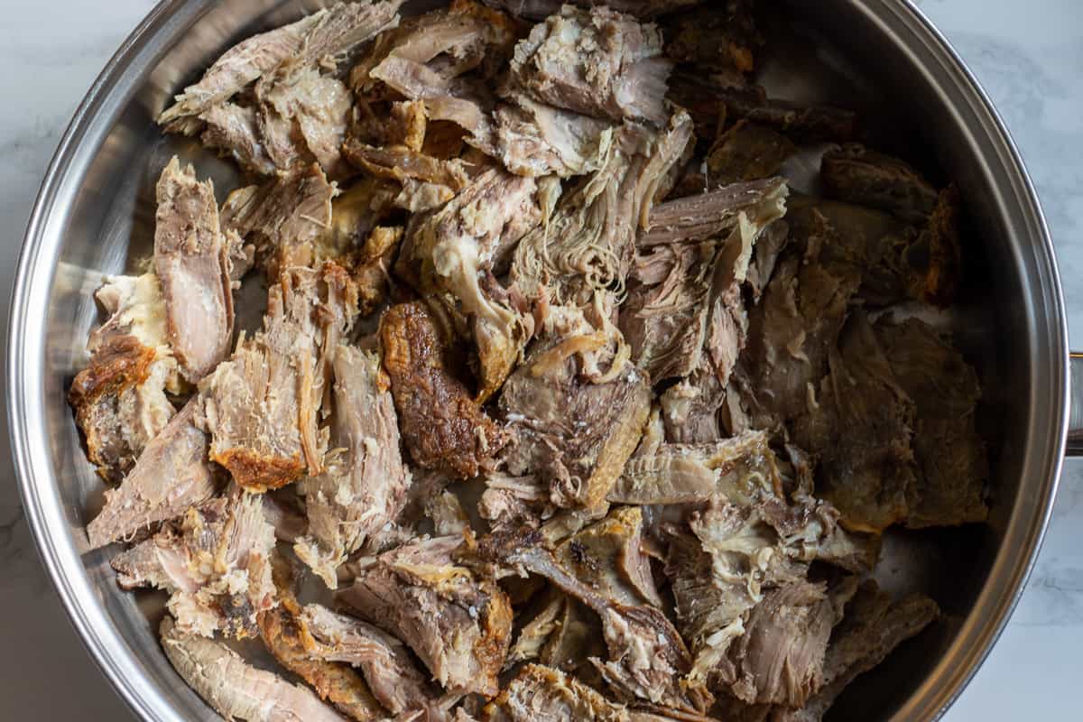 layer the meat on the bottom of the pan