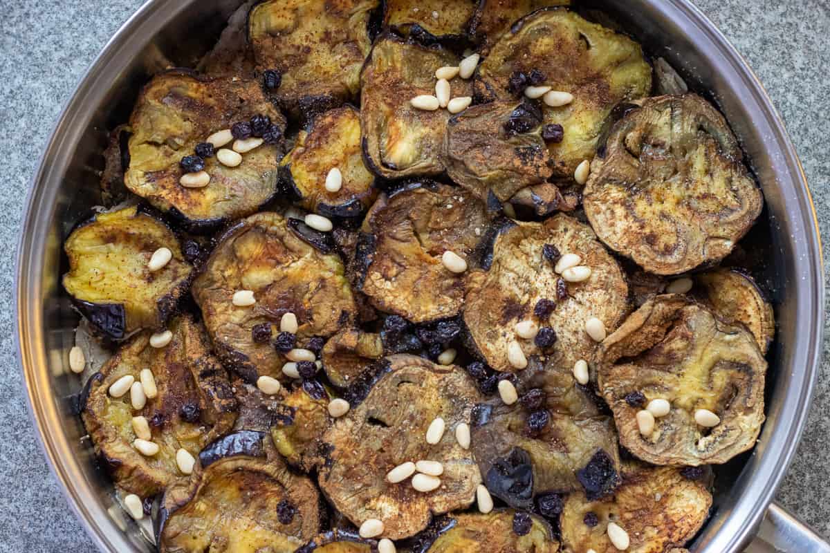 layer the aubergines on top of the meat