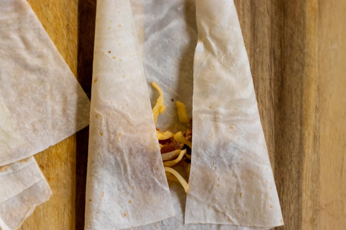 the sides are folded towards the filling