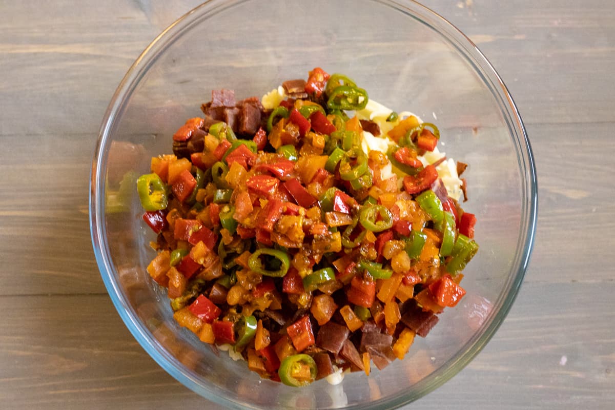 the vegetables are added to cheese mixture