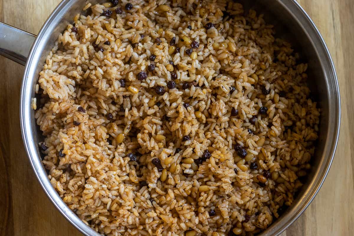 the shredded chicken is mixed with rice