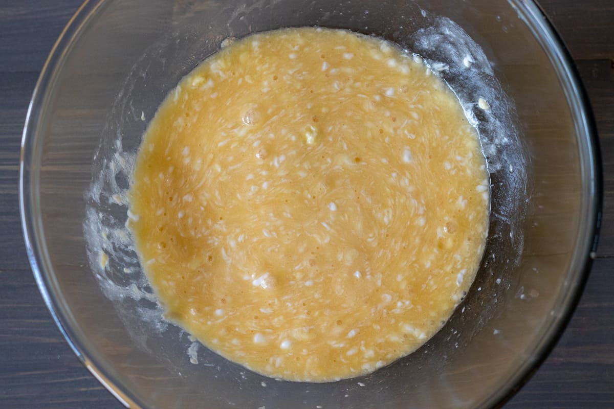 the eggs, yoghurt, oil and butter are whisked in a bowl