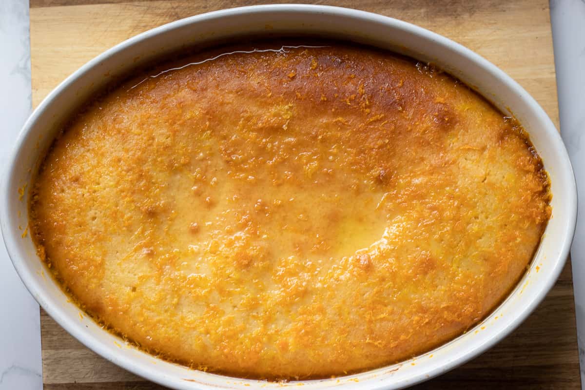 cooled syrup is poured over revani cake