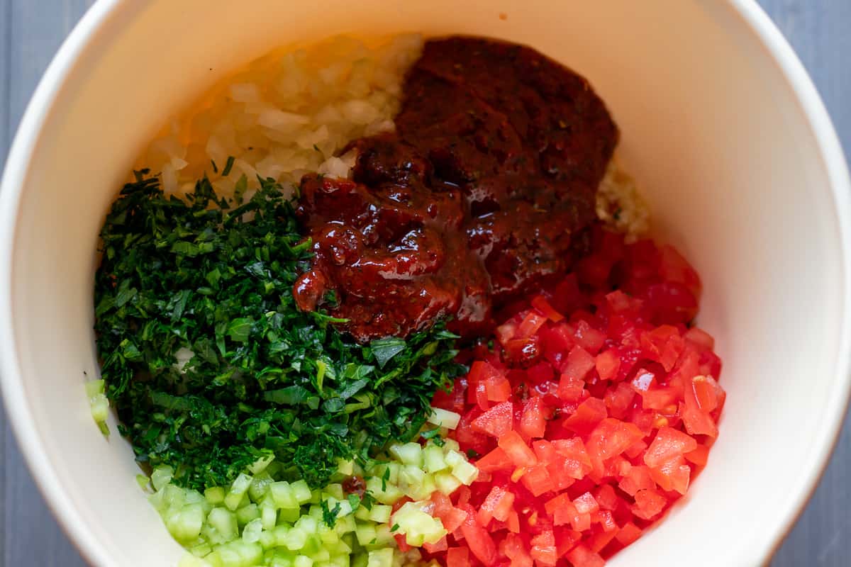 the dressing is added to the vegetables