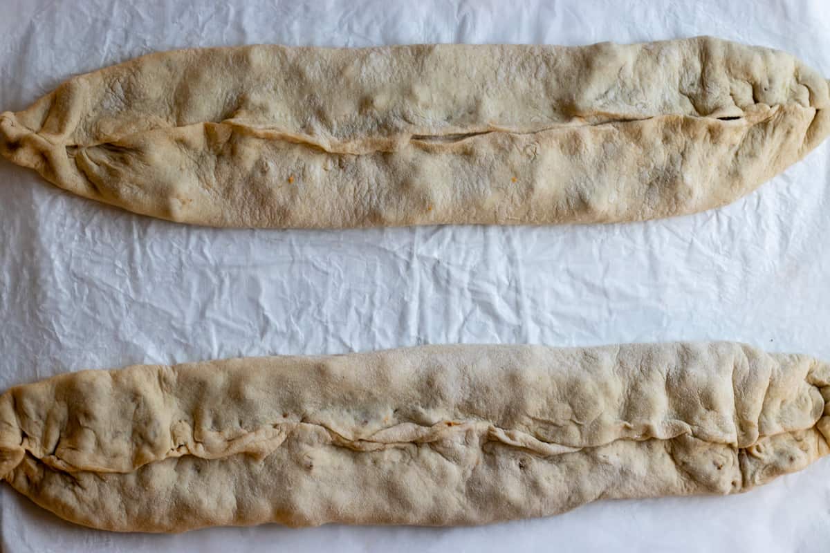 The edges of the dough is folded on the filling