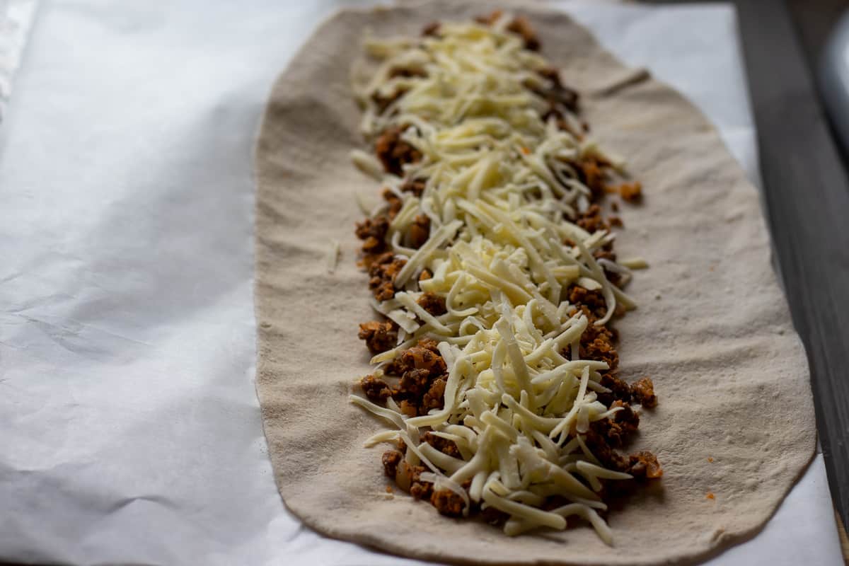 grated cheese added to mince filling for Karadeniz Pidesi