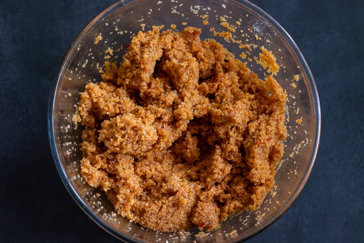 bulgur wheat and aromatics are mixed well until all incorporated