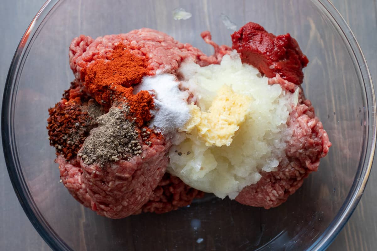 meatball ingredients are placed in a bowl
