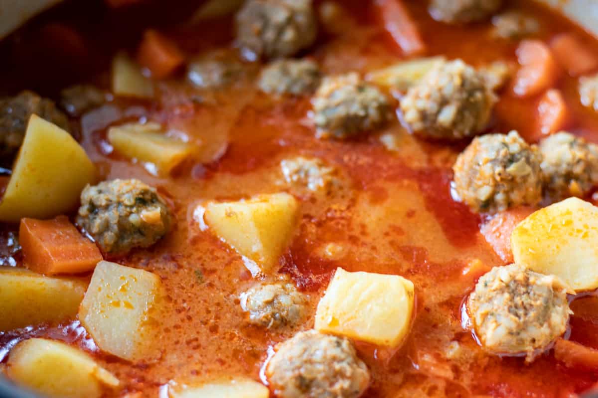 carrots and potatoes are cooked until soft