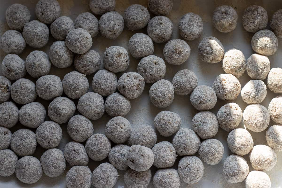 meatballs are dusted with flour