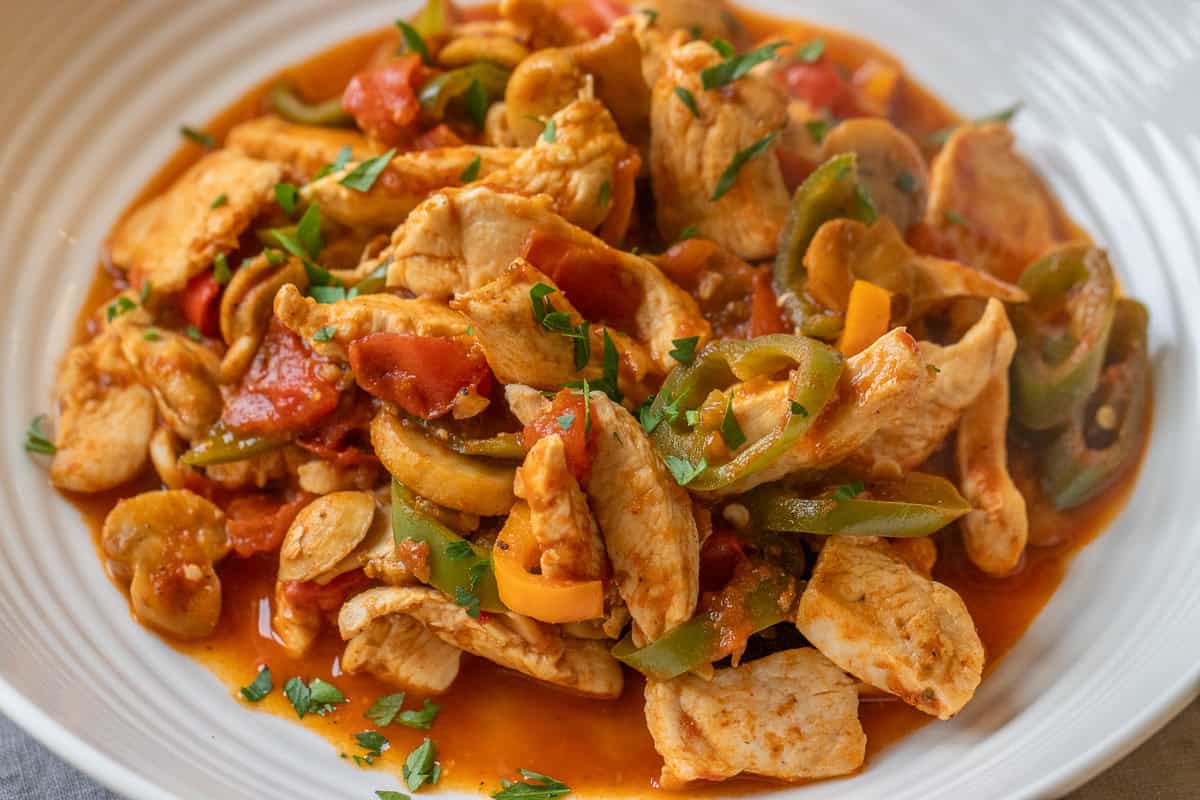 chicken saute garnished with parsley