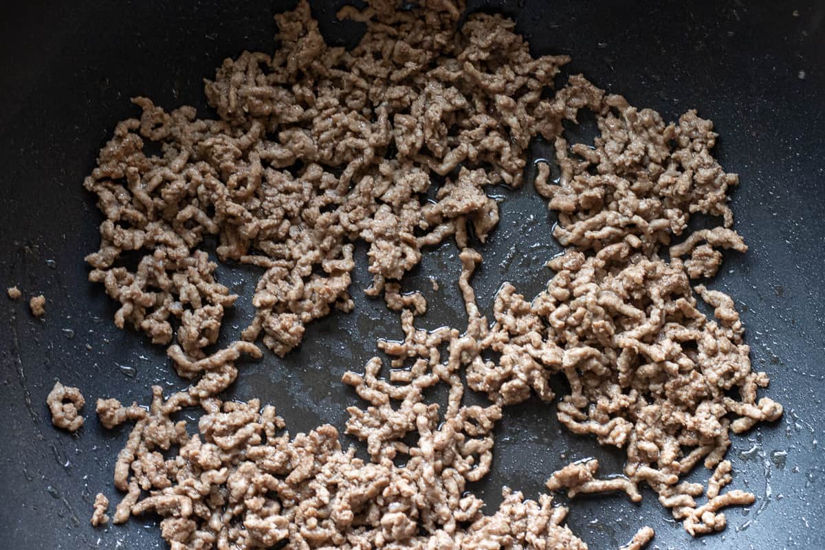 Browning the mince with olive oil