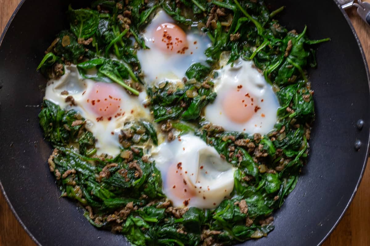 the eggs are cracked into wells