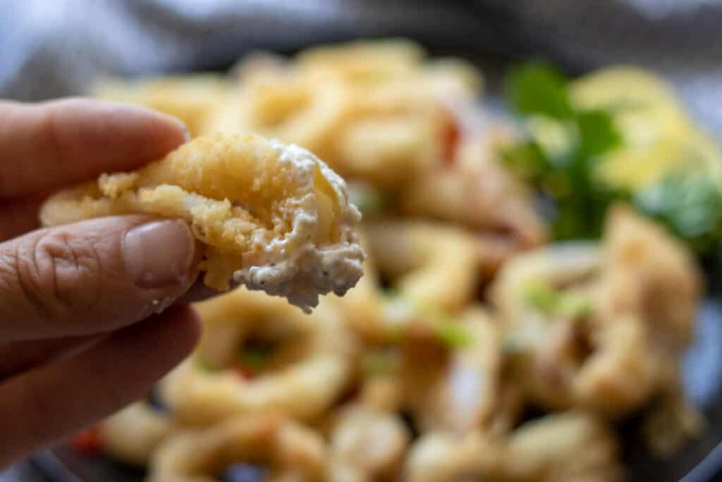 calamari fritti dipped in tartar sauce