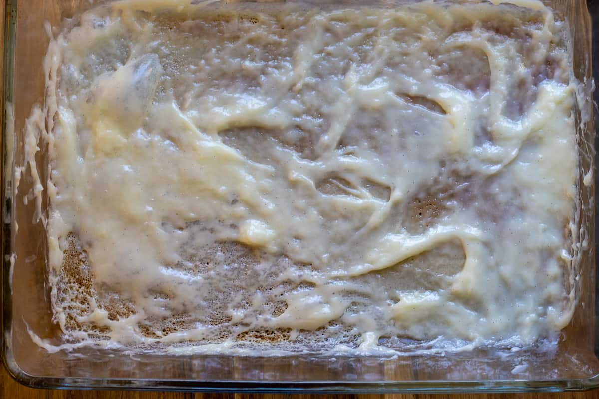 spread ¼ of the custard on the tray