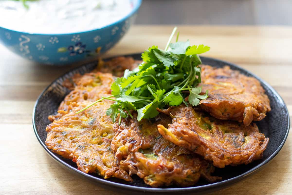 serve the pakoras with raita