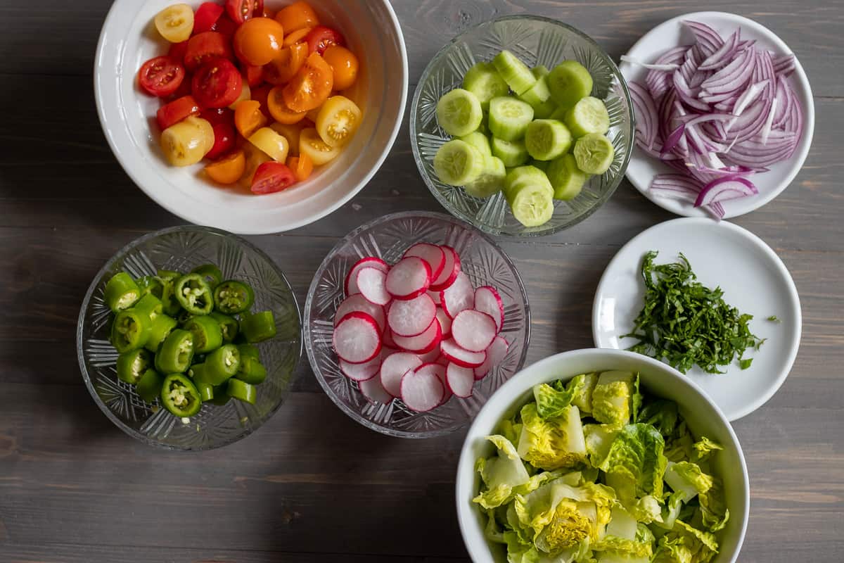 Fattoush salad ingredients prepared and ready to mix with the dressing