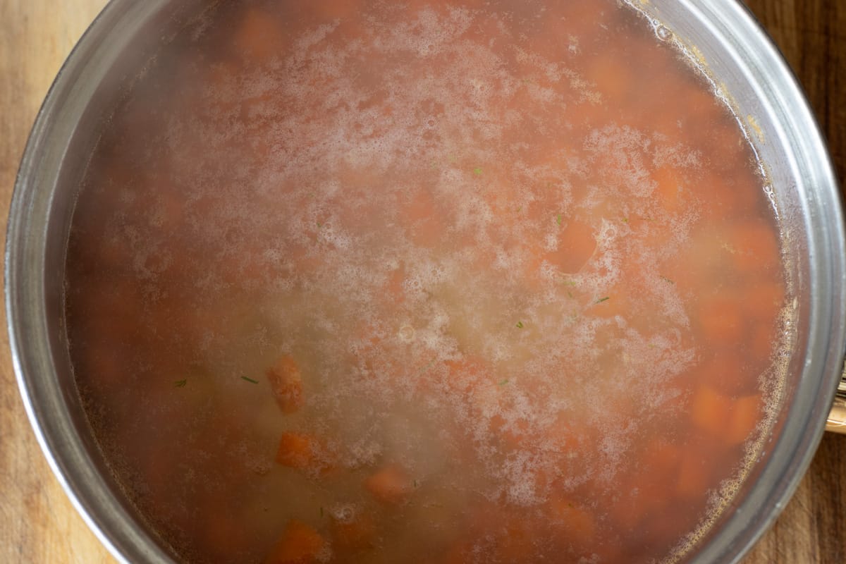 diced potatoes are added to the pan